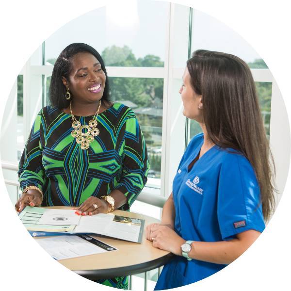 Advisor speaking to a nursing student